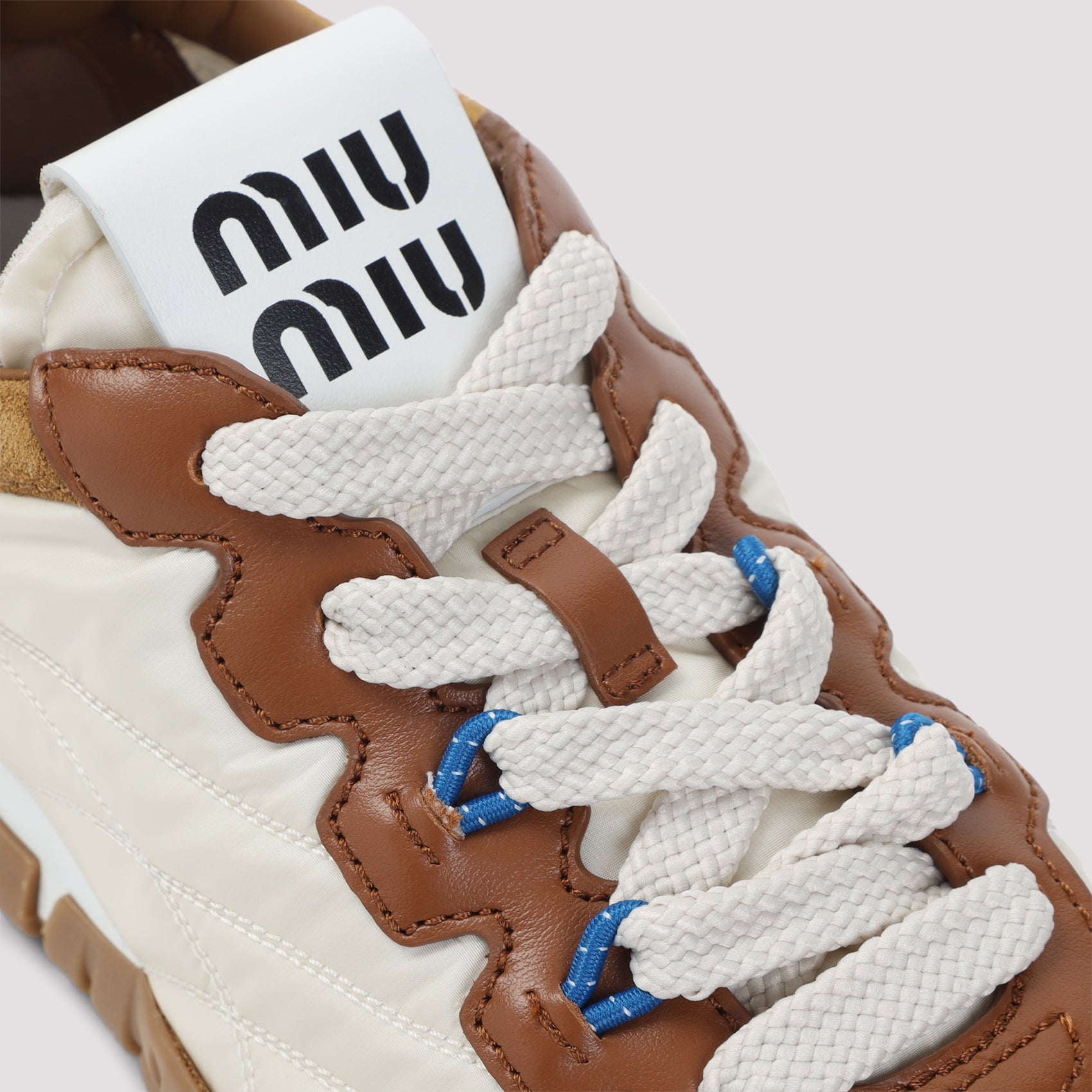Miu Miu Tyre Sneakers - WOMEN SHOES - Miu Miu - T.Luxy