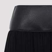 AlaÏA Midi skirts - Black | 38a0b6e86db738ed4a36040cd28149adda0281d3